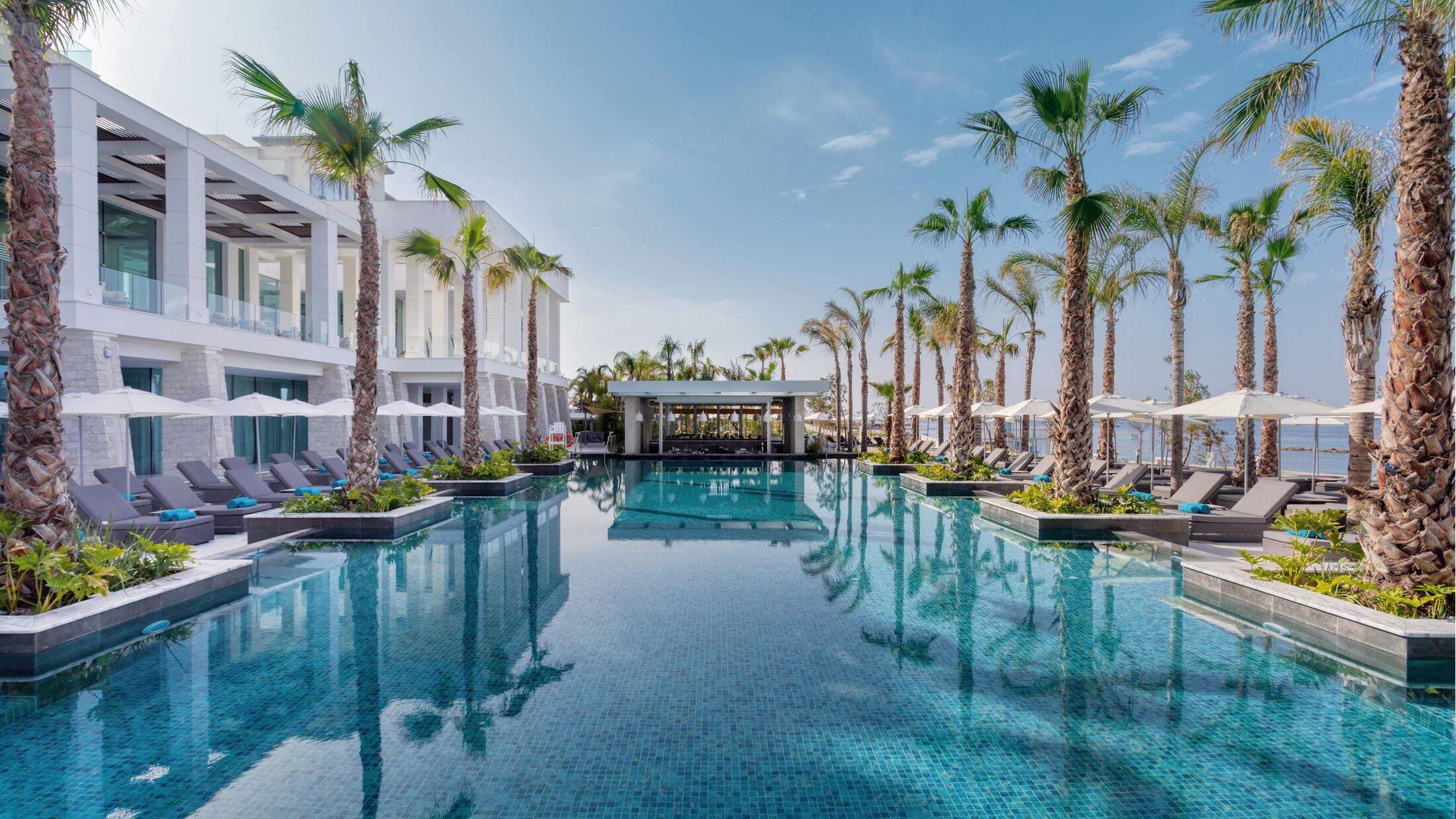 a large pool of water in front of a building